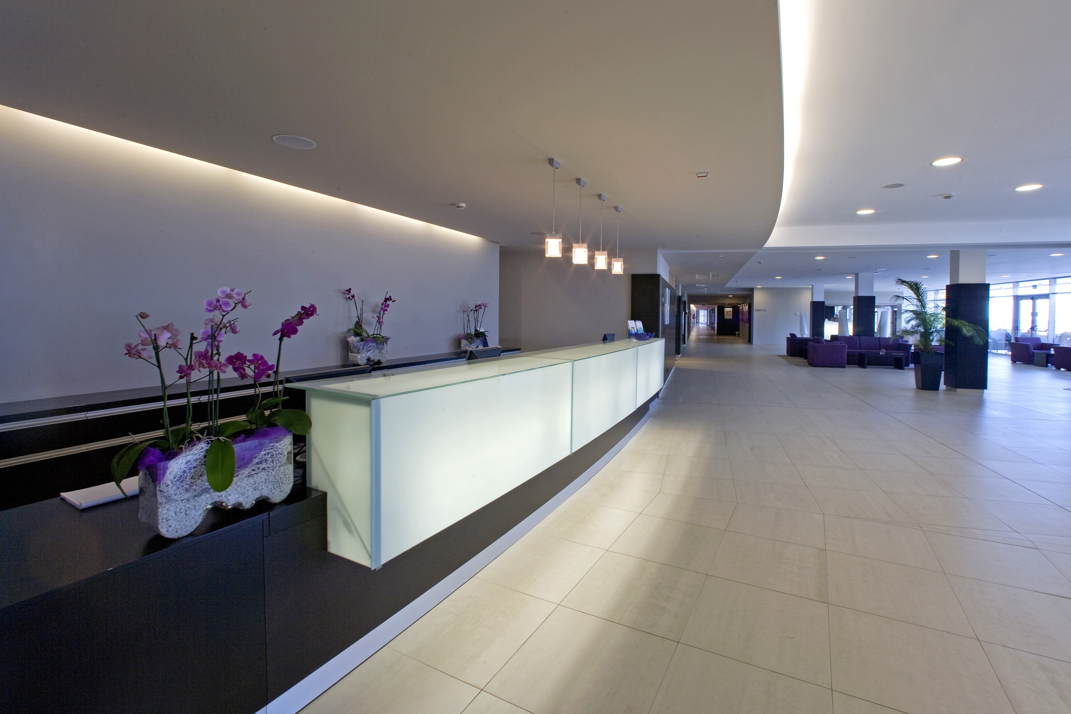 a reception desk in a hotel