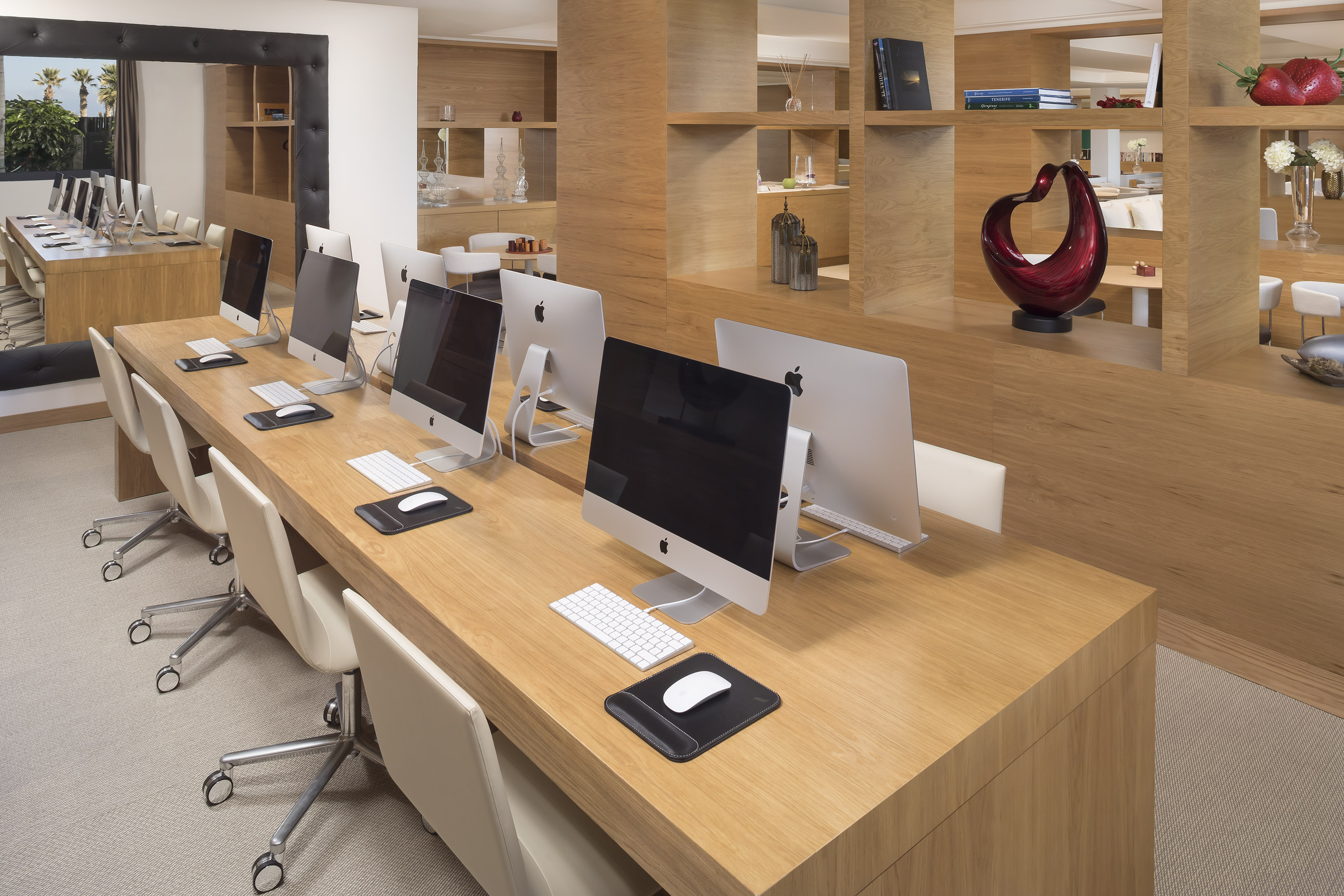 a desk with computers on it