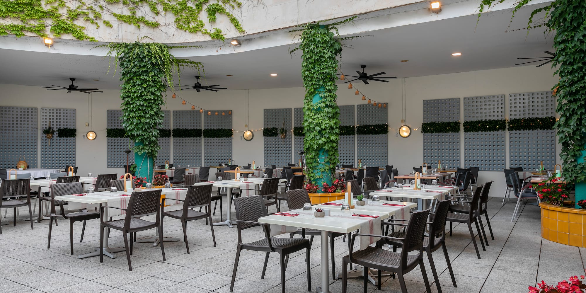 a restaurant with tables and chairs