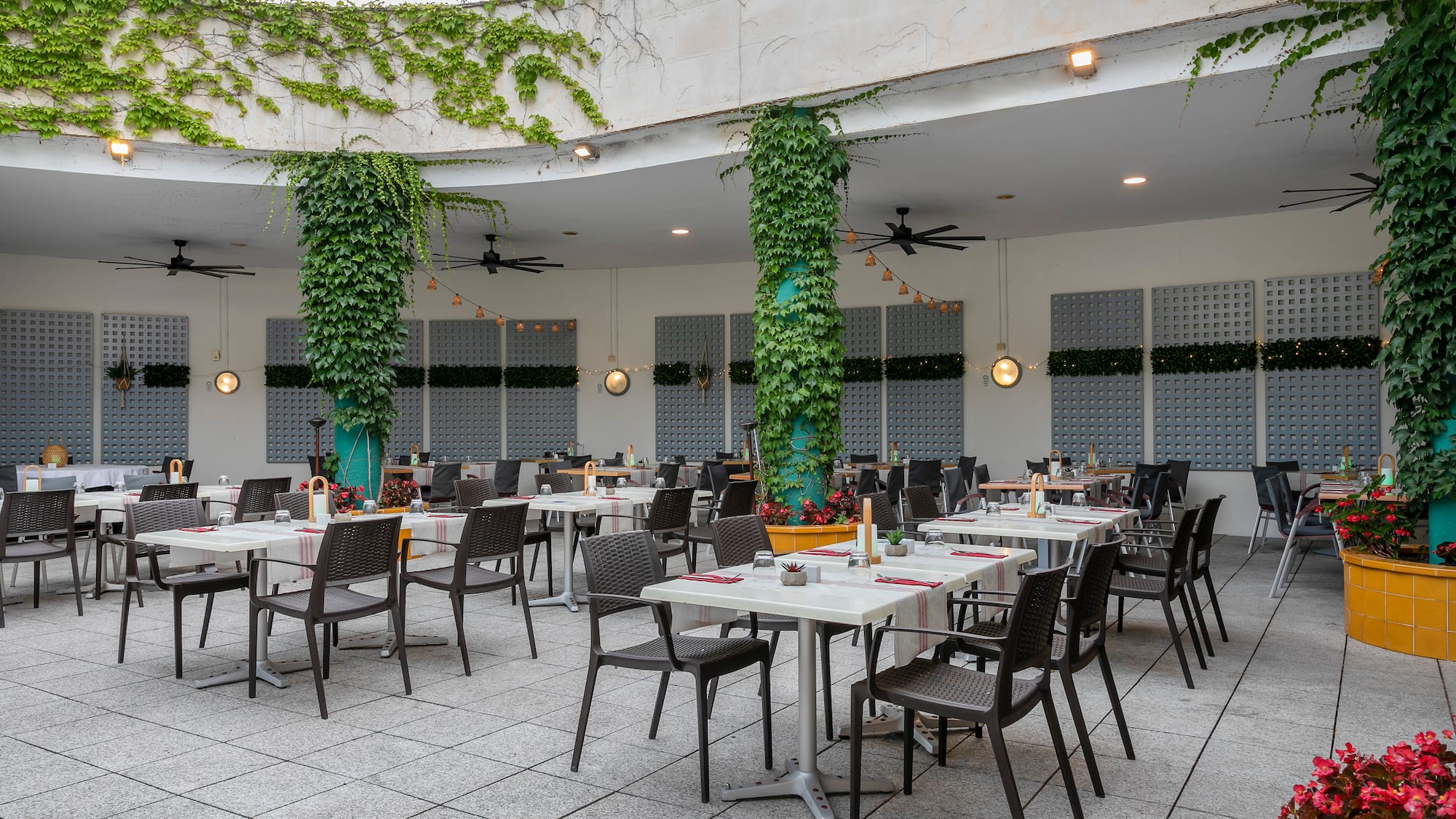 a restaurant with tables and chairs