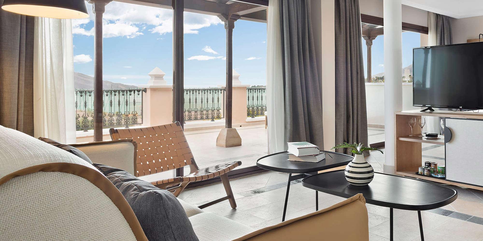 a living room with a couch and a table