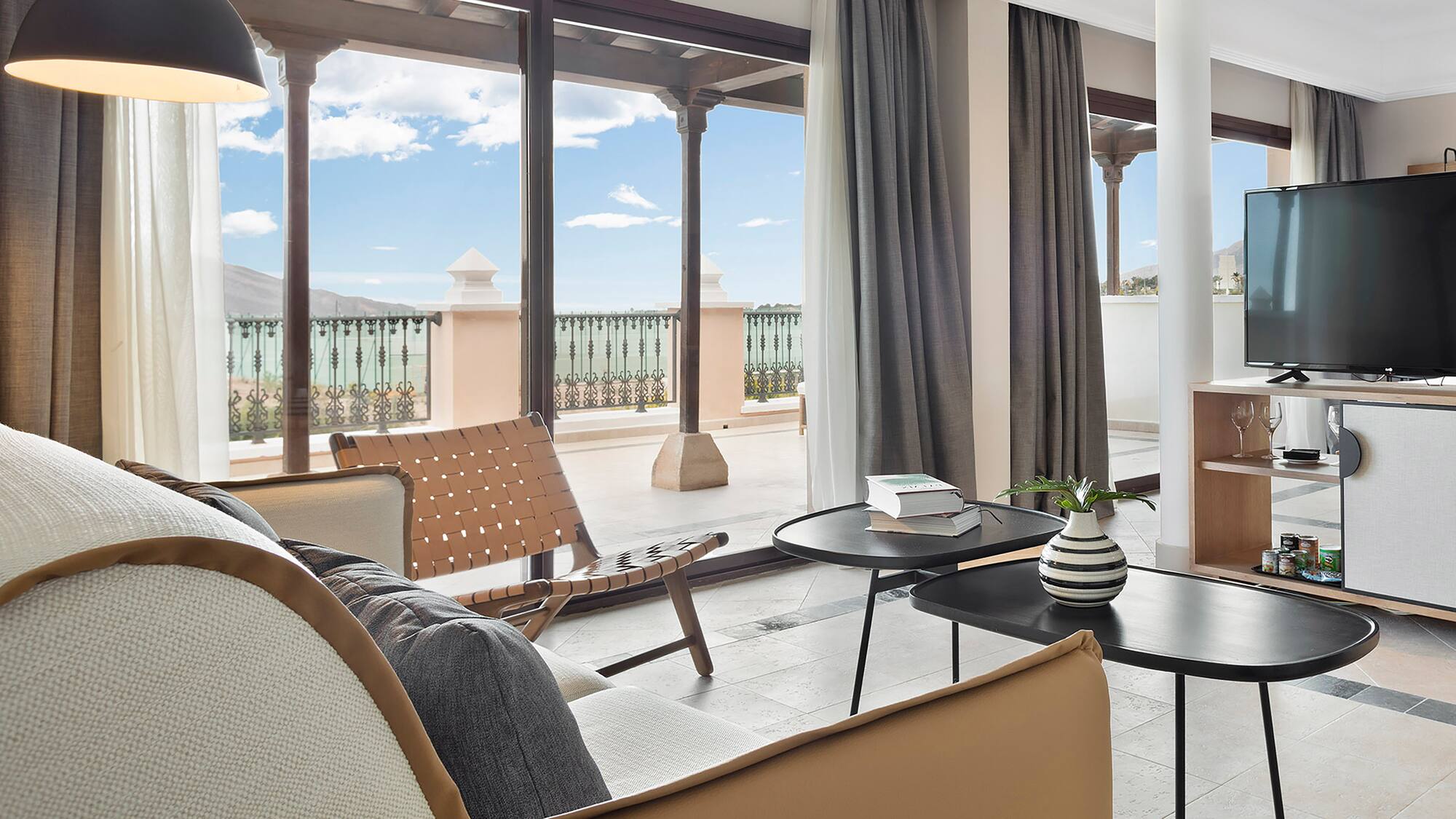 a living room with a couch and a table.