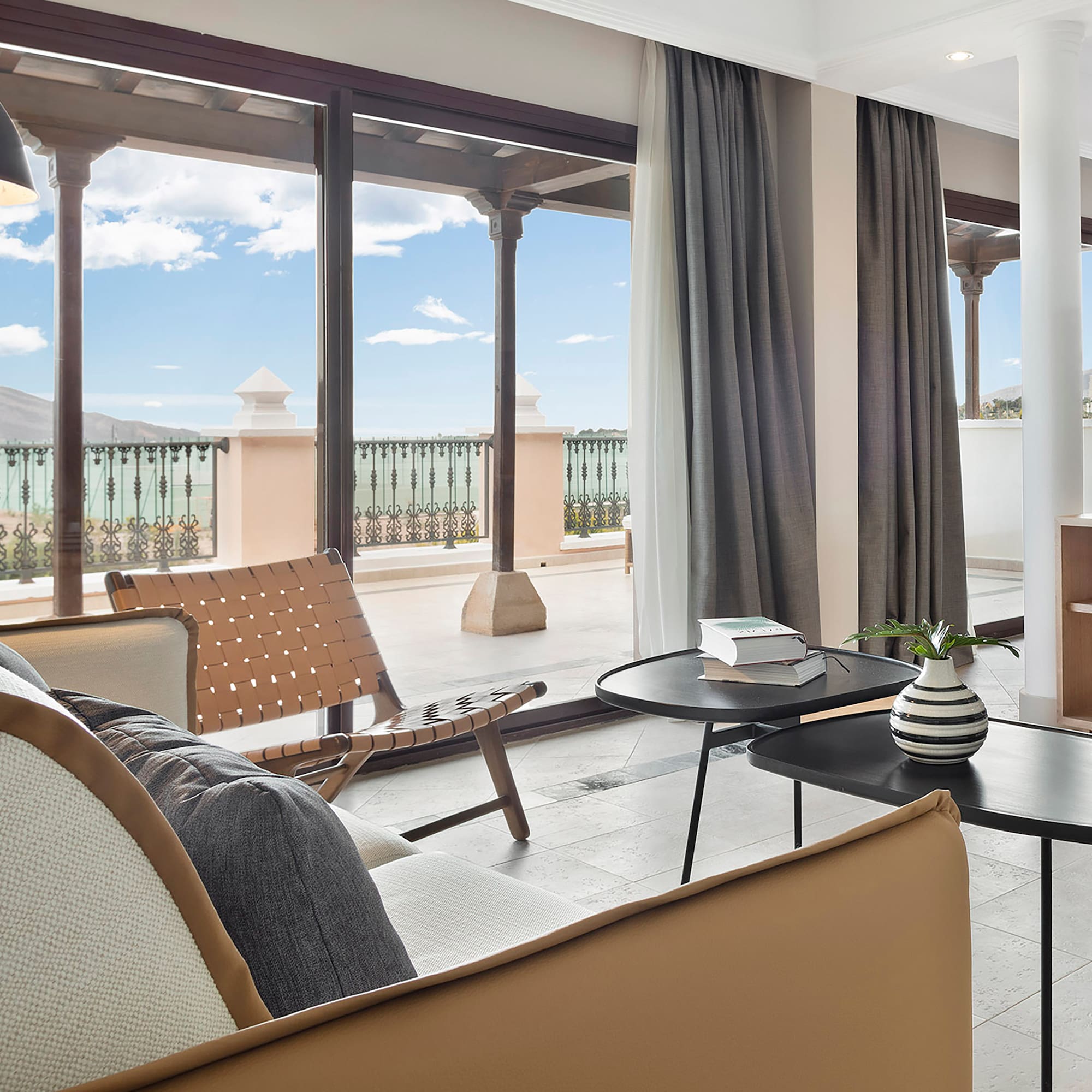 a living room with a couch and a table.