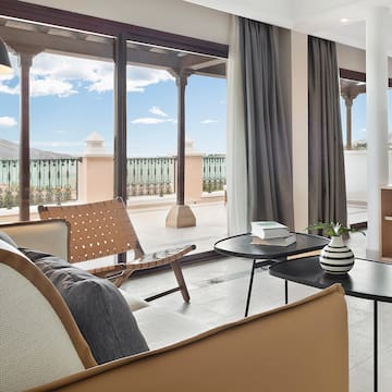 a living room with a couch and a table