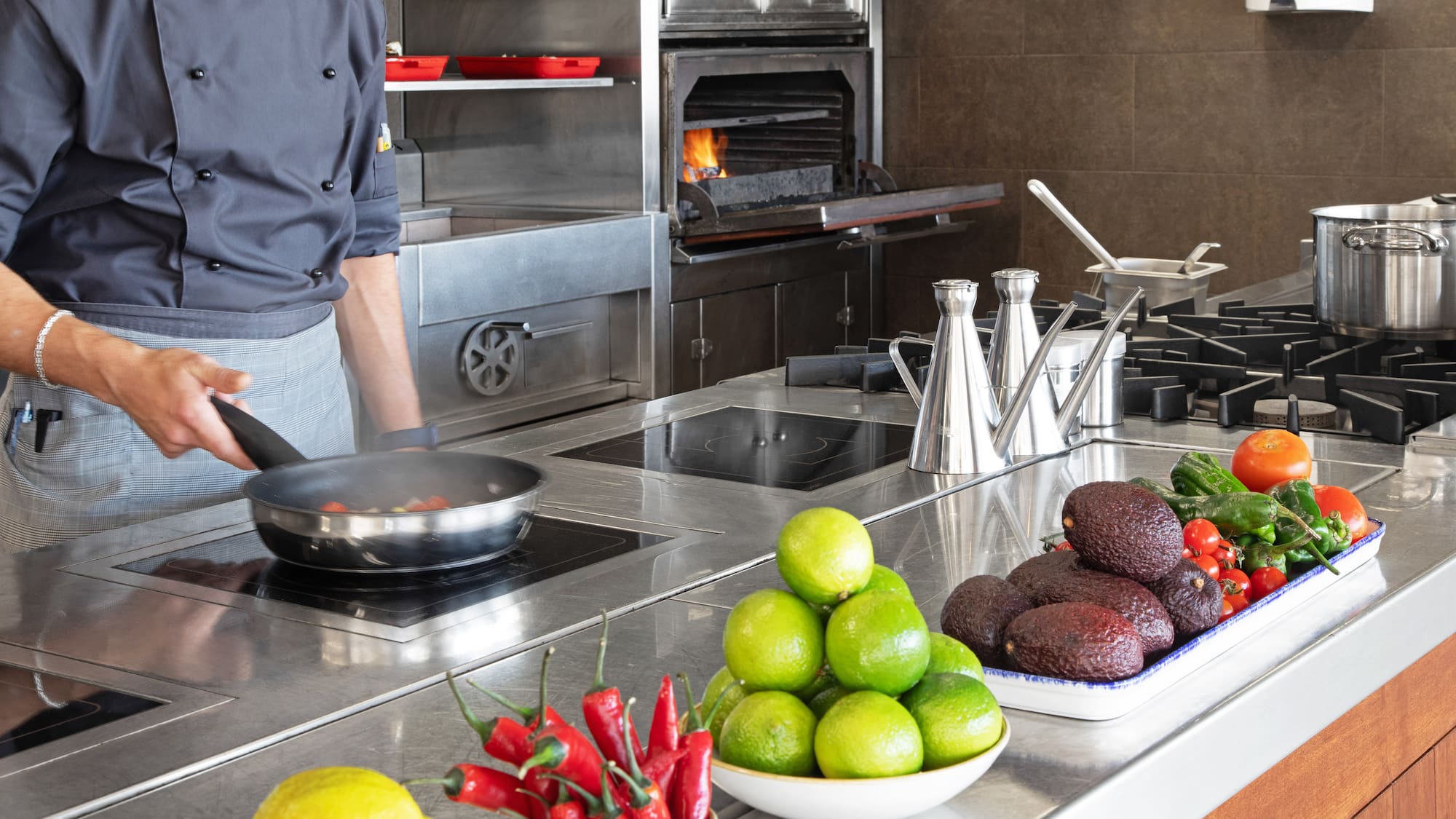 a man cooking in a kitchen