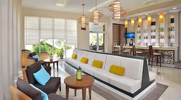 a room with a couch and tables