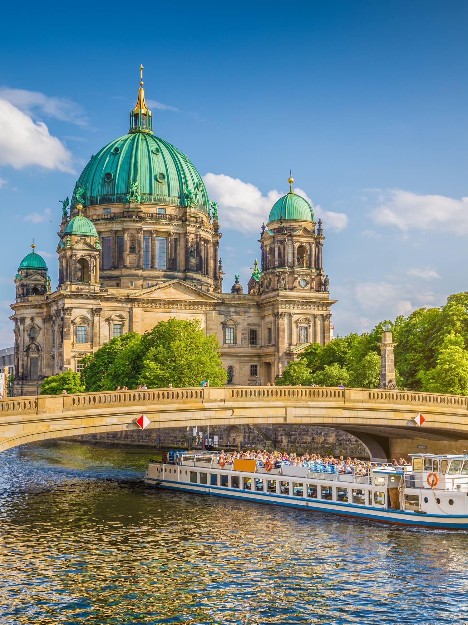 a boat on a river with a building in the background