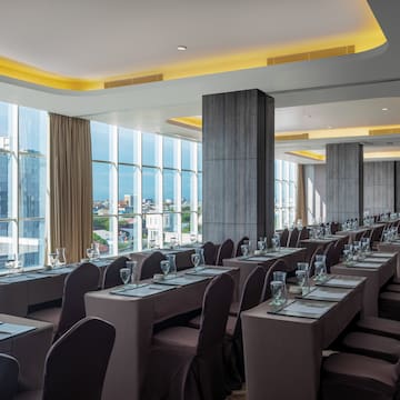 a room with tables and chairs