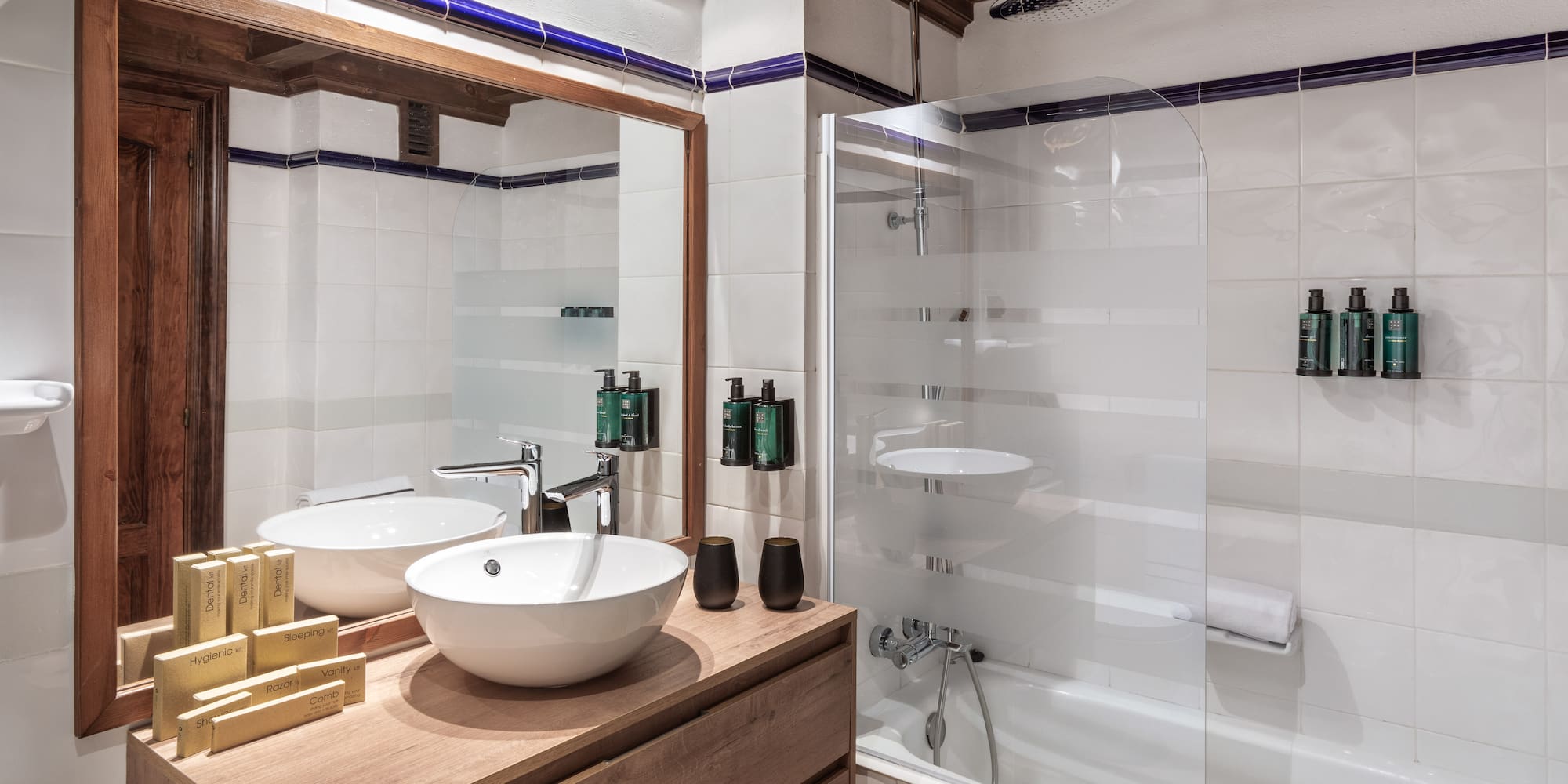 a bathroom with a shower and sink