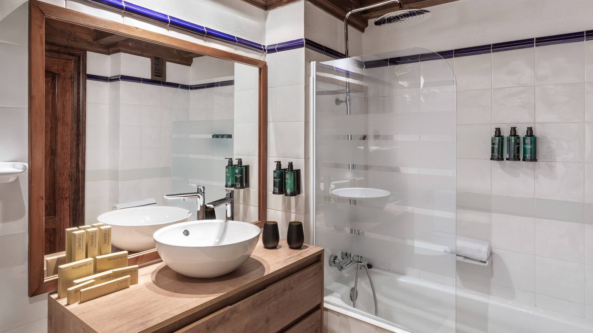 a bathroom with a shower and sink