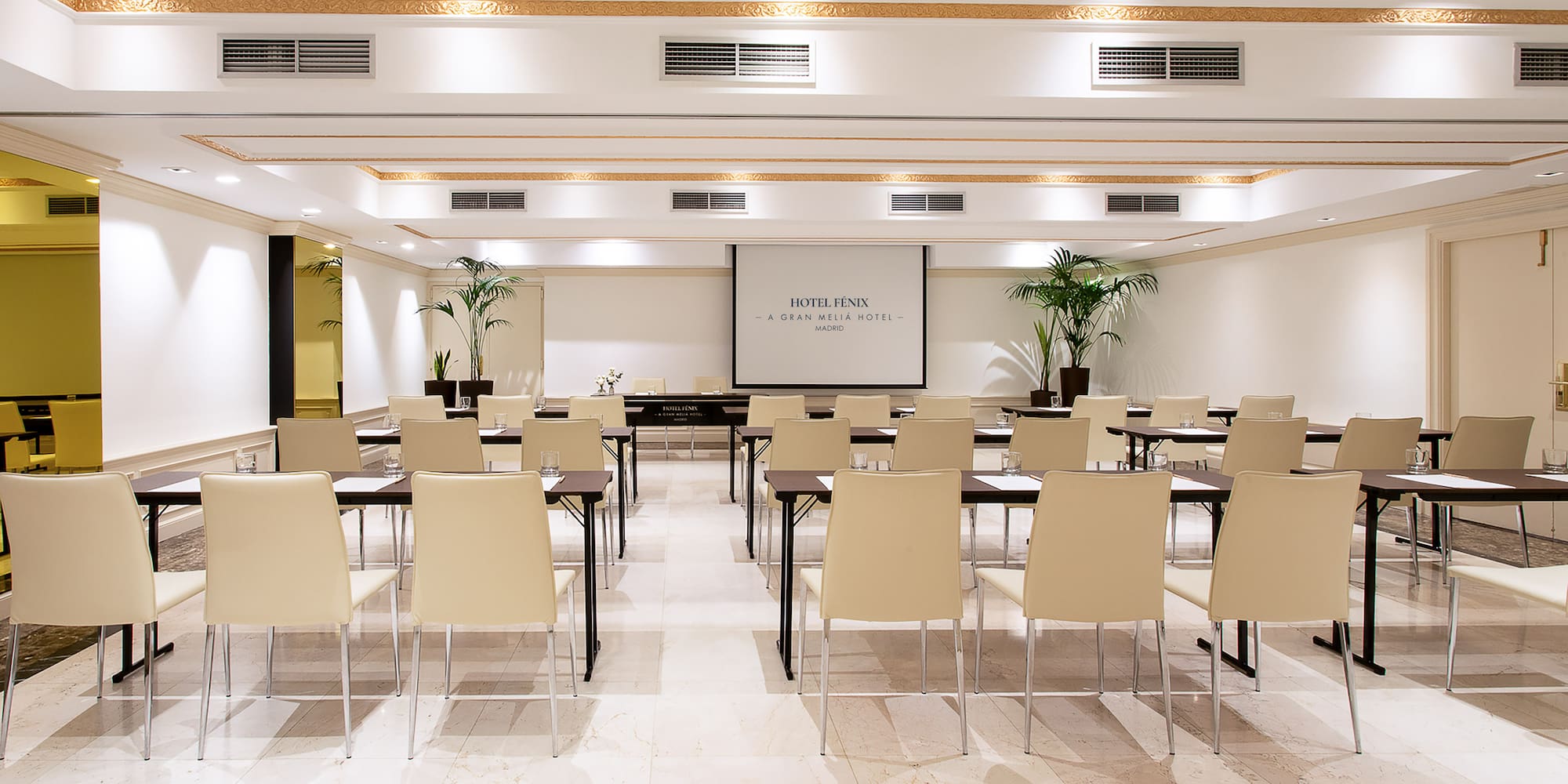 a room with tables and chairs