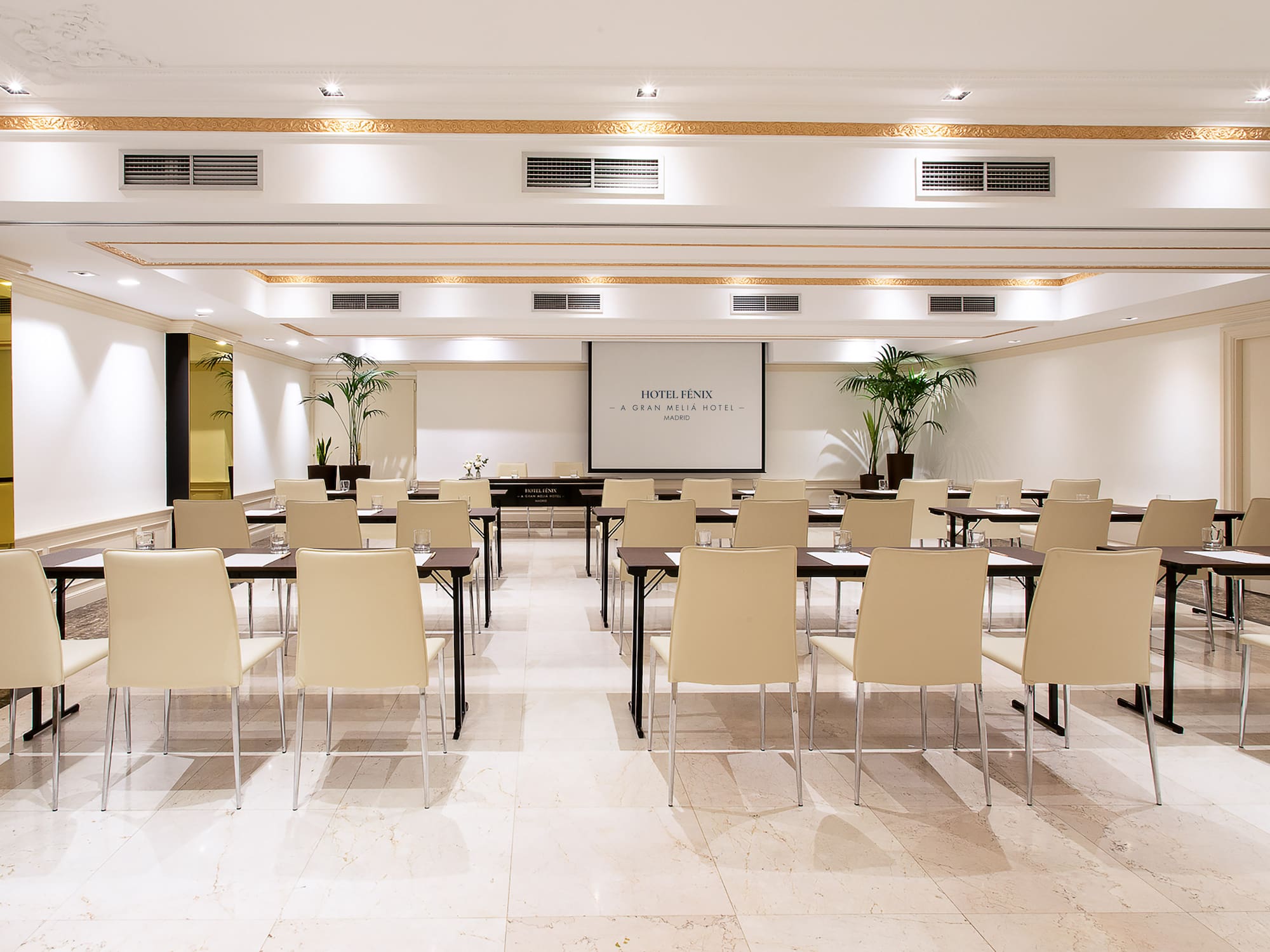 a room with tables and chairs