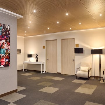 a room with a picture on the wall