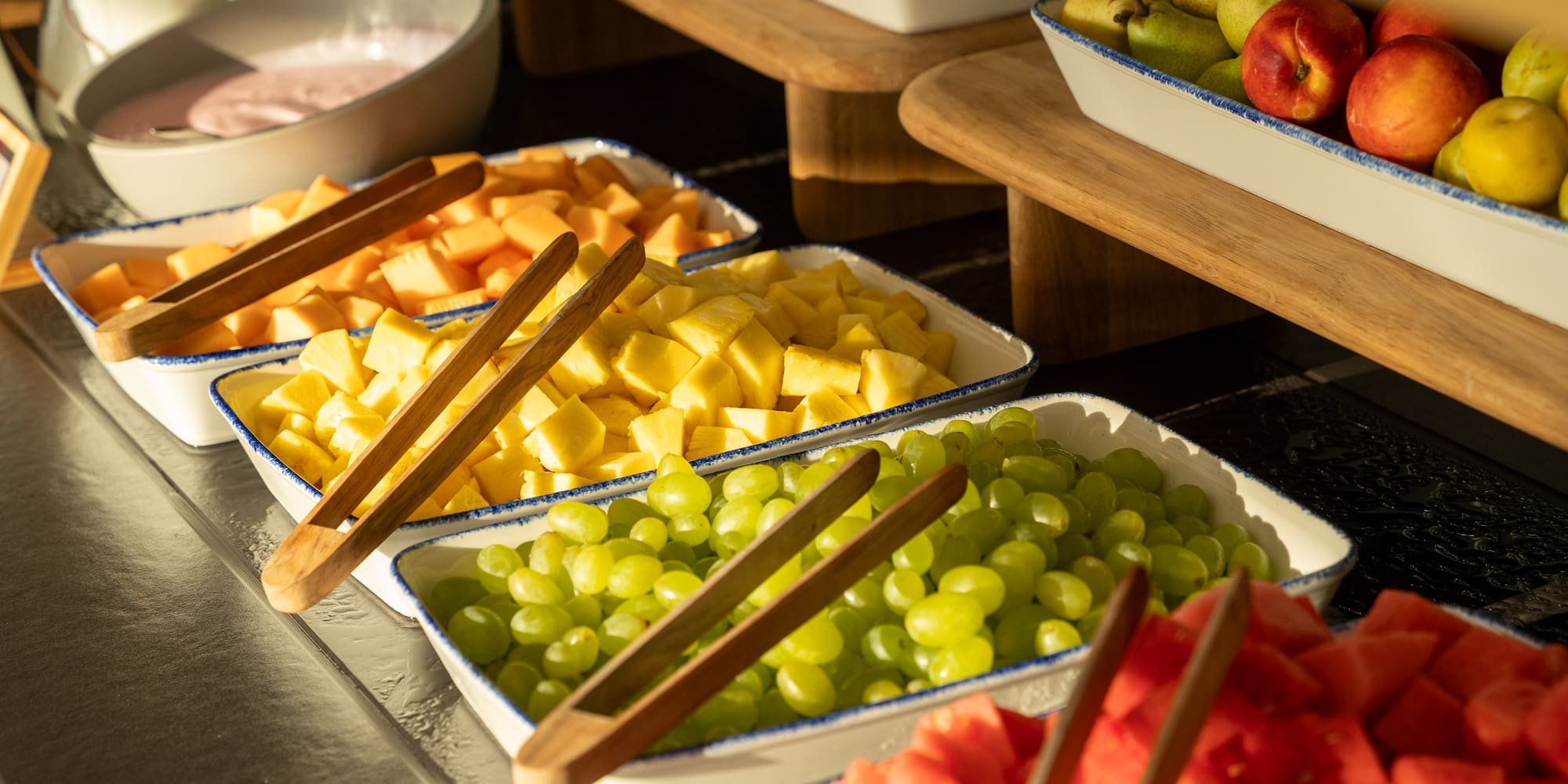 a group of bowls of fruit