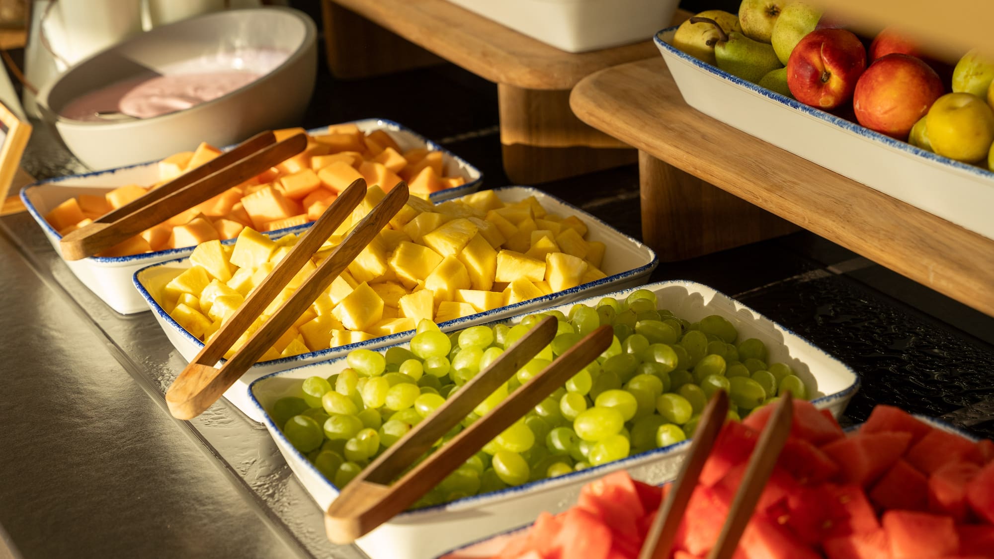 a group of bowls of fruit
