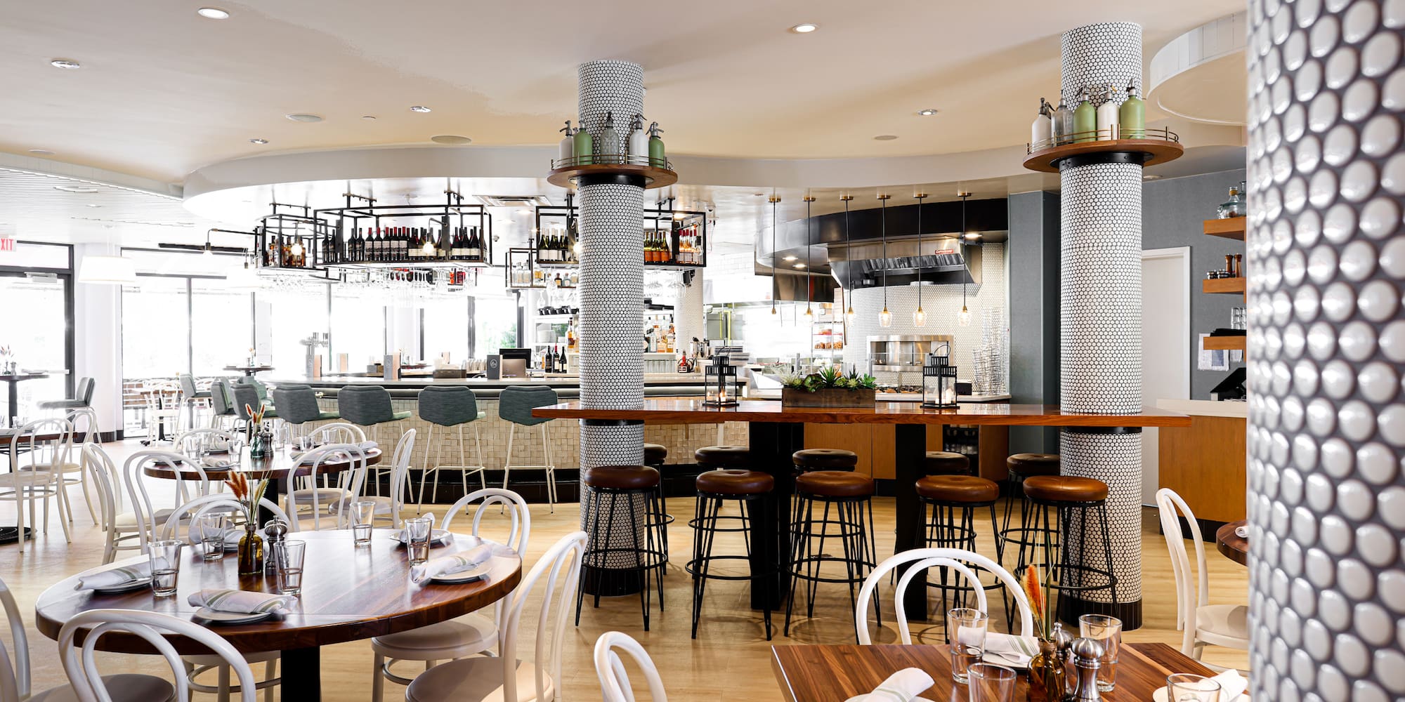 a restaurant with tables and chairs