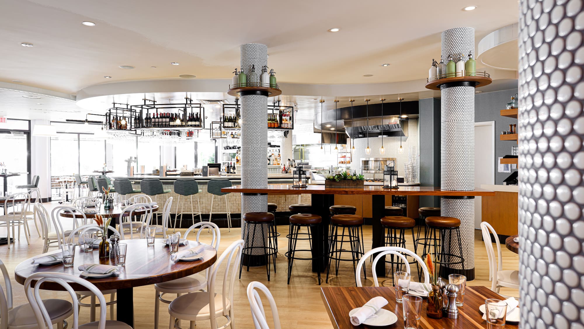a restaurant with tables and chairs