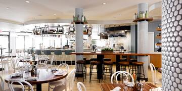 a restaurant with tables and chairs