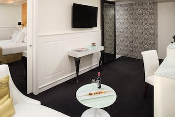 a room with a table and a tv