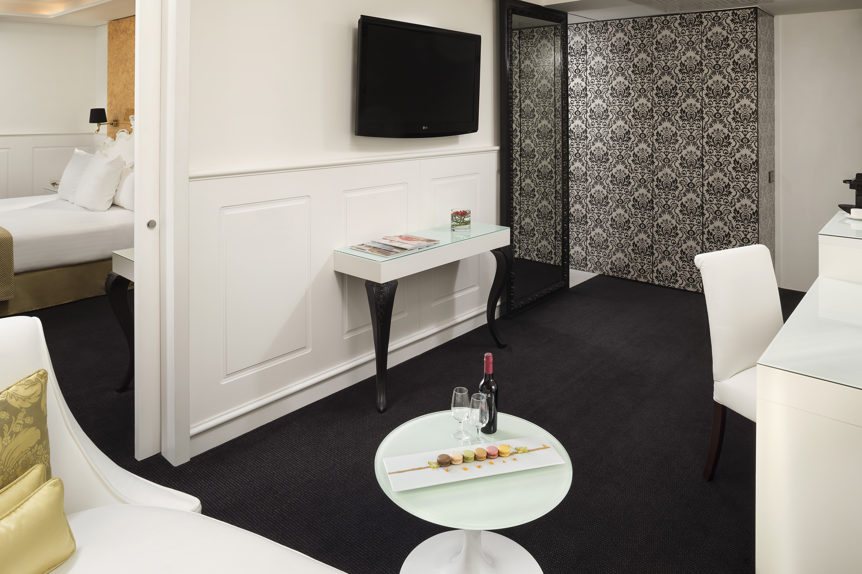 a room with a table and a tv