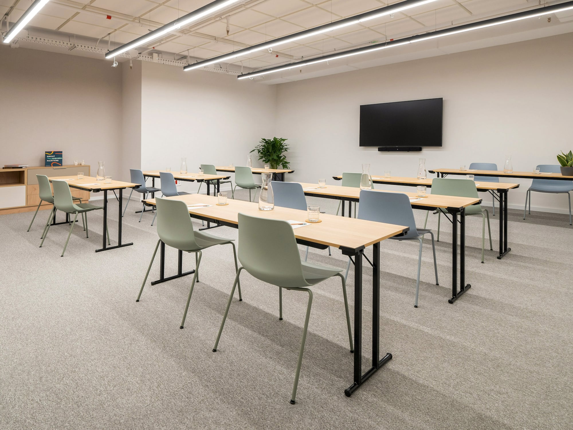 a room with tables and chairs