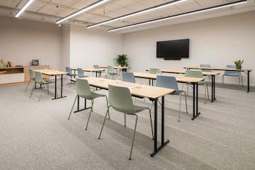 a room with tables and chairs