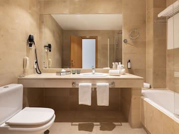 a bathroom with a sink and a bathtub