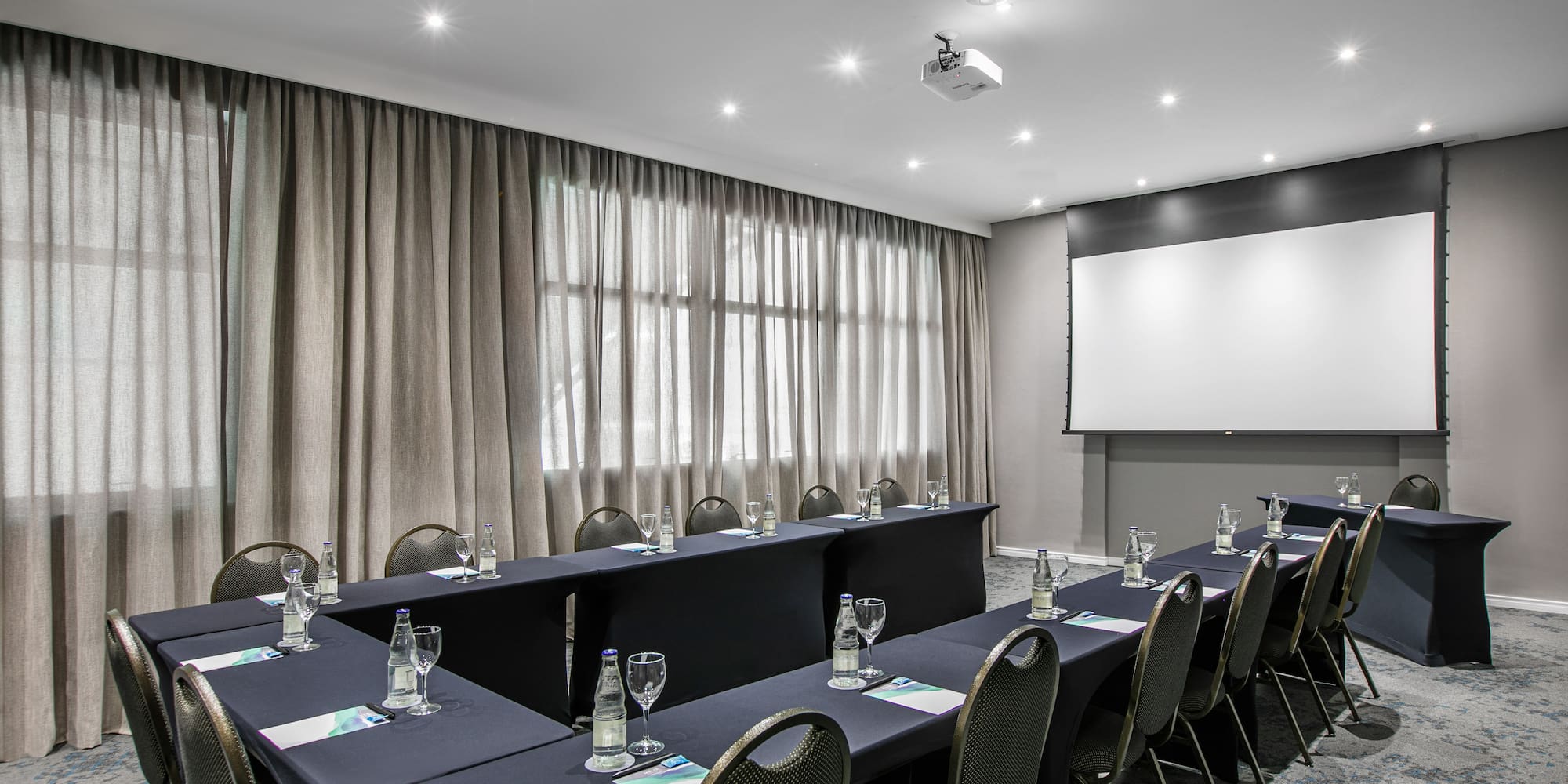 a room with tables and chairs