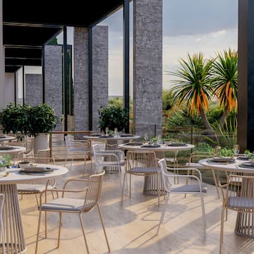 a restaurant with tables and chairs