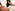 Hands giving a back massage to a person in a serene spa.