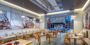 a room with tables and chairs