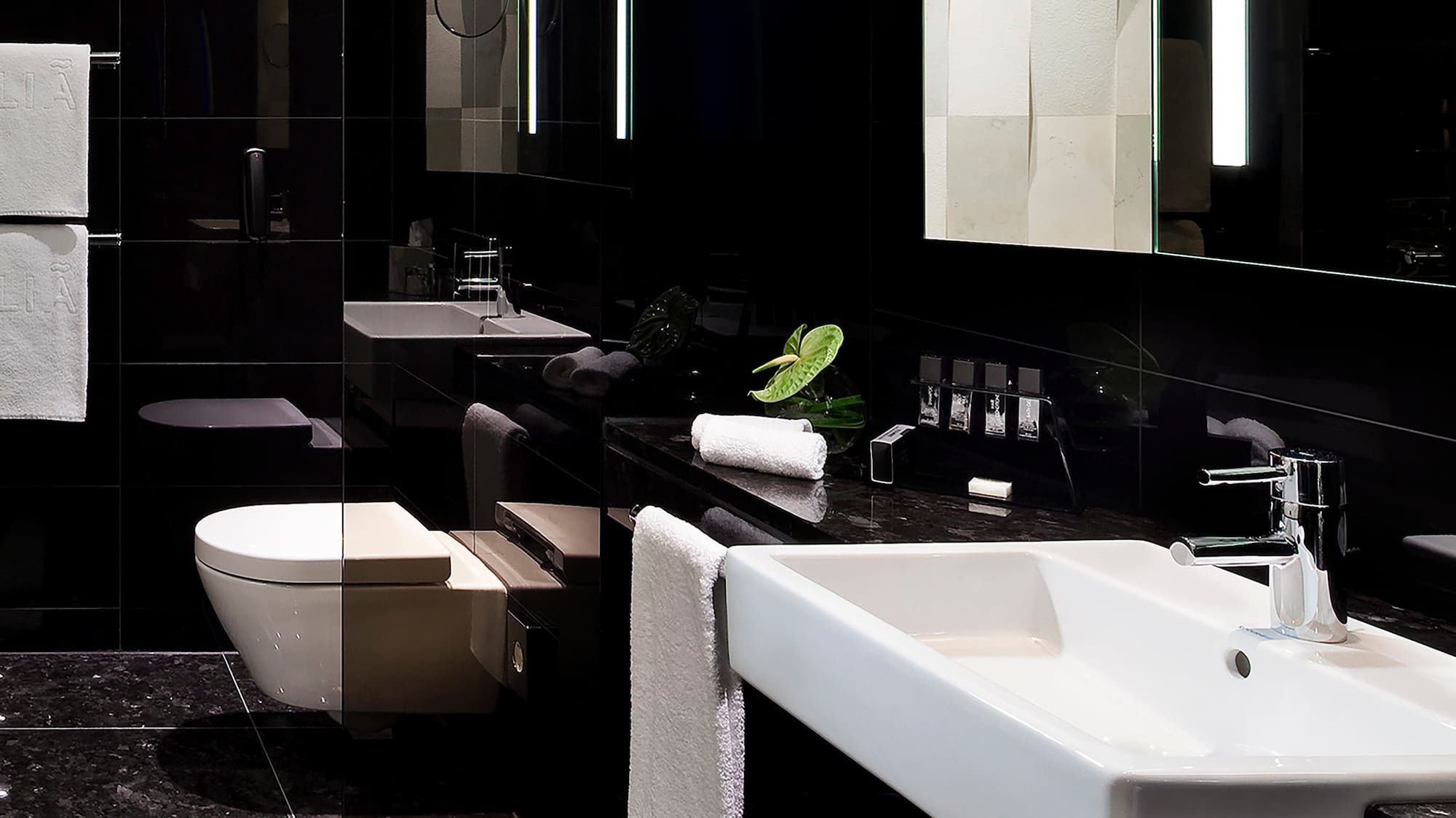 a bathroom with a sink and mirror