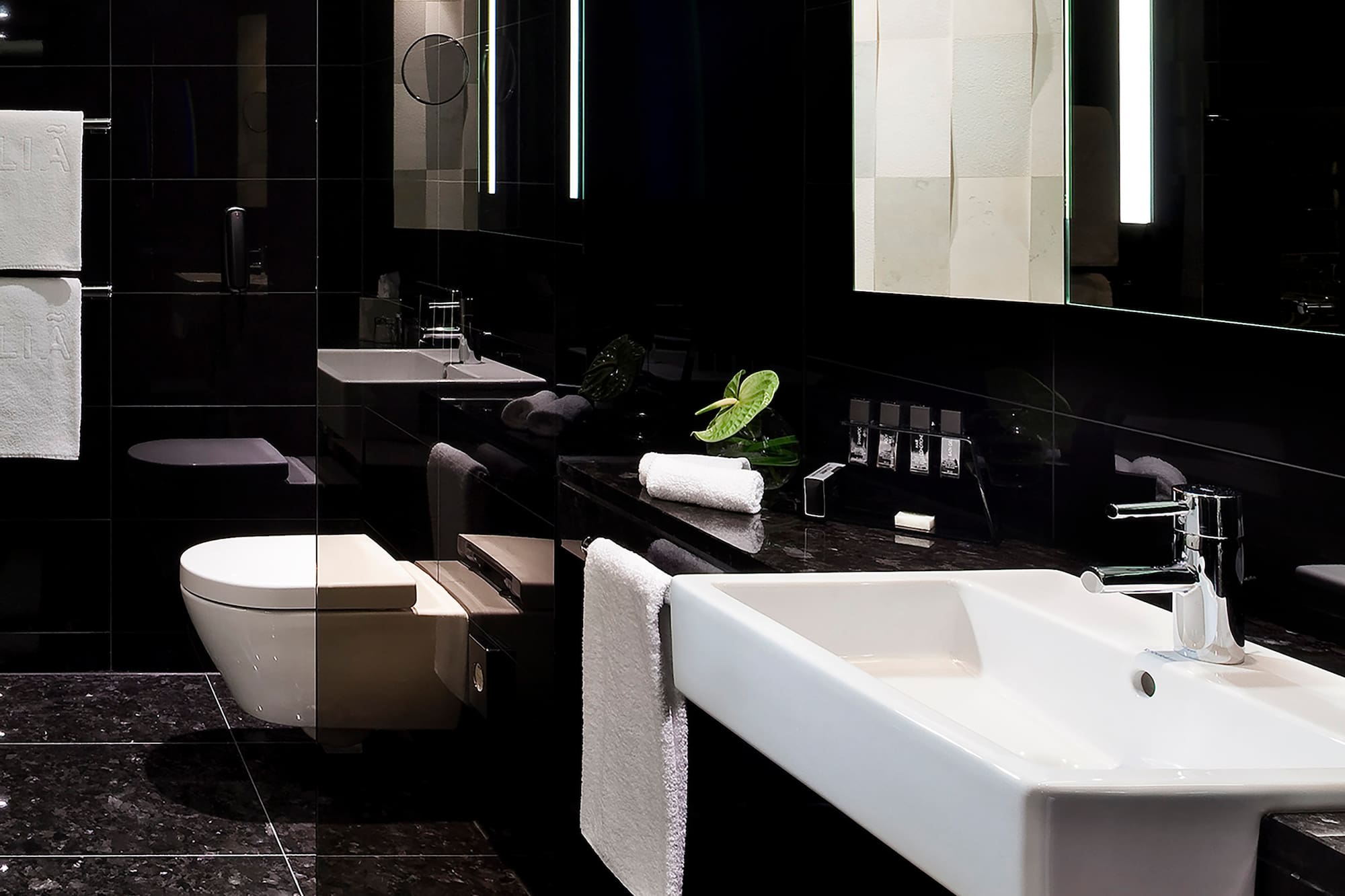 a bathroom with a sink and mirror