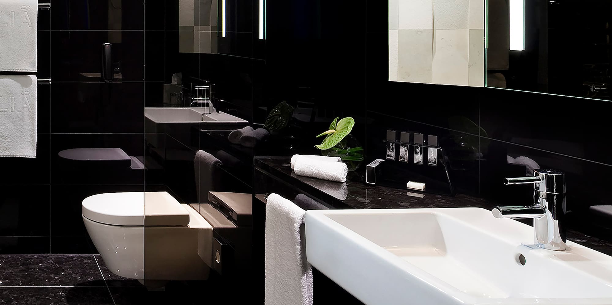 a bathroom with a sink and mirror