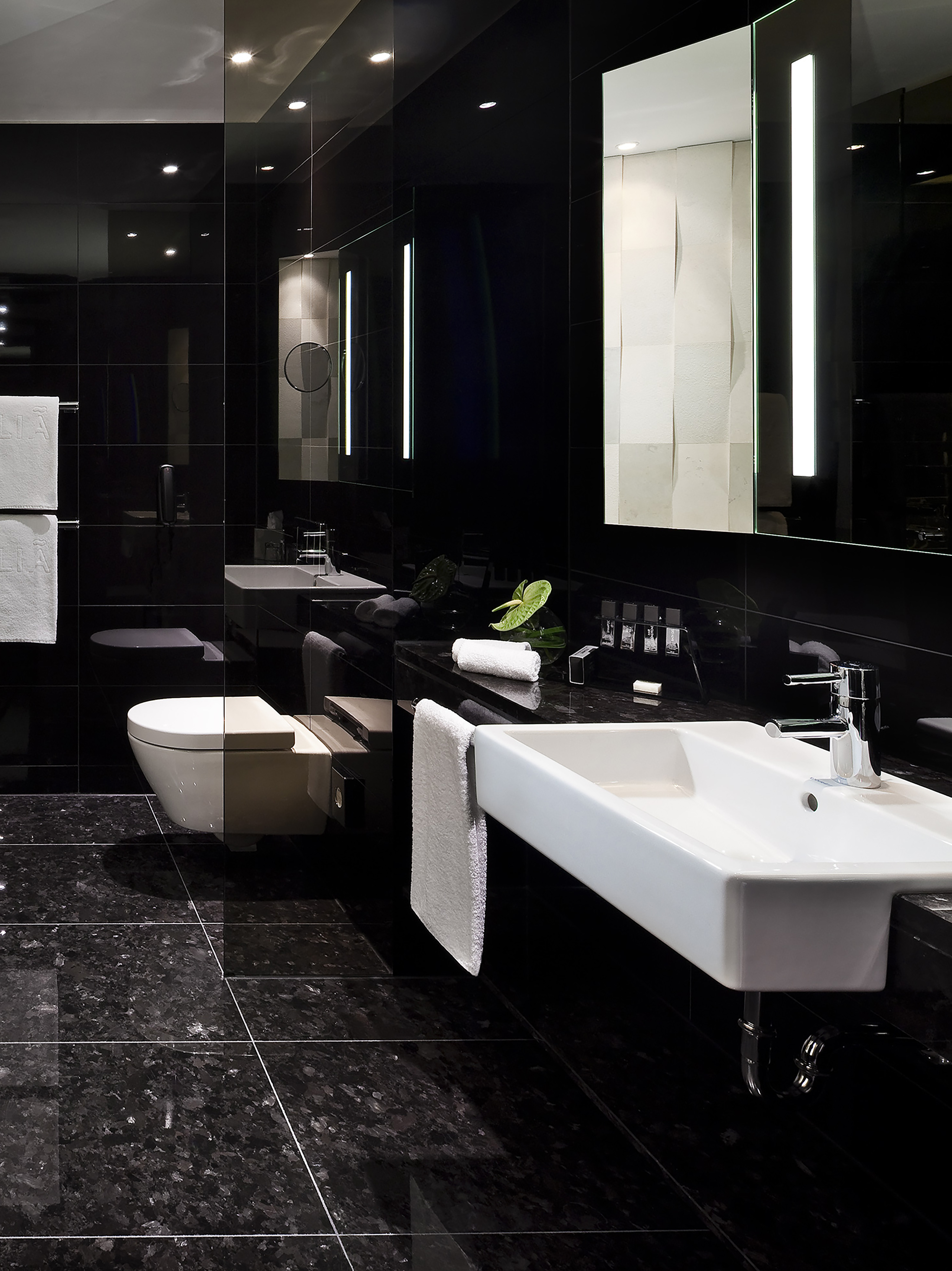 a bathroom with a sink and mirror