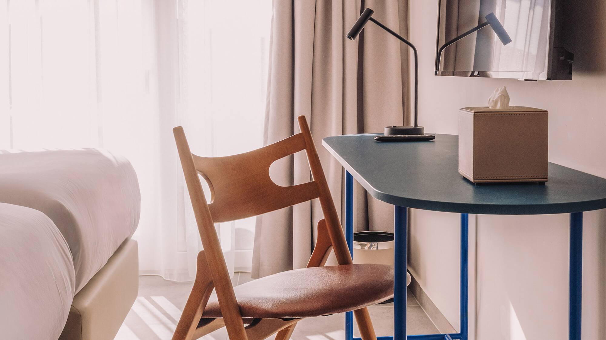 a chair and desk in a room