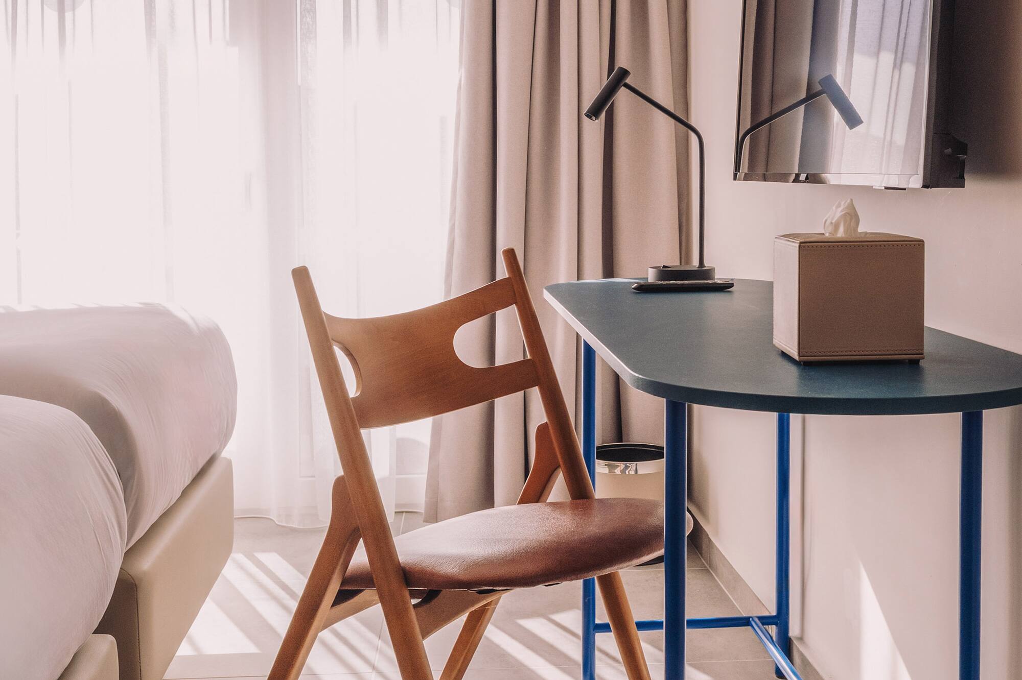 a chair and desk in a room