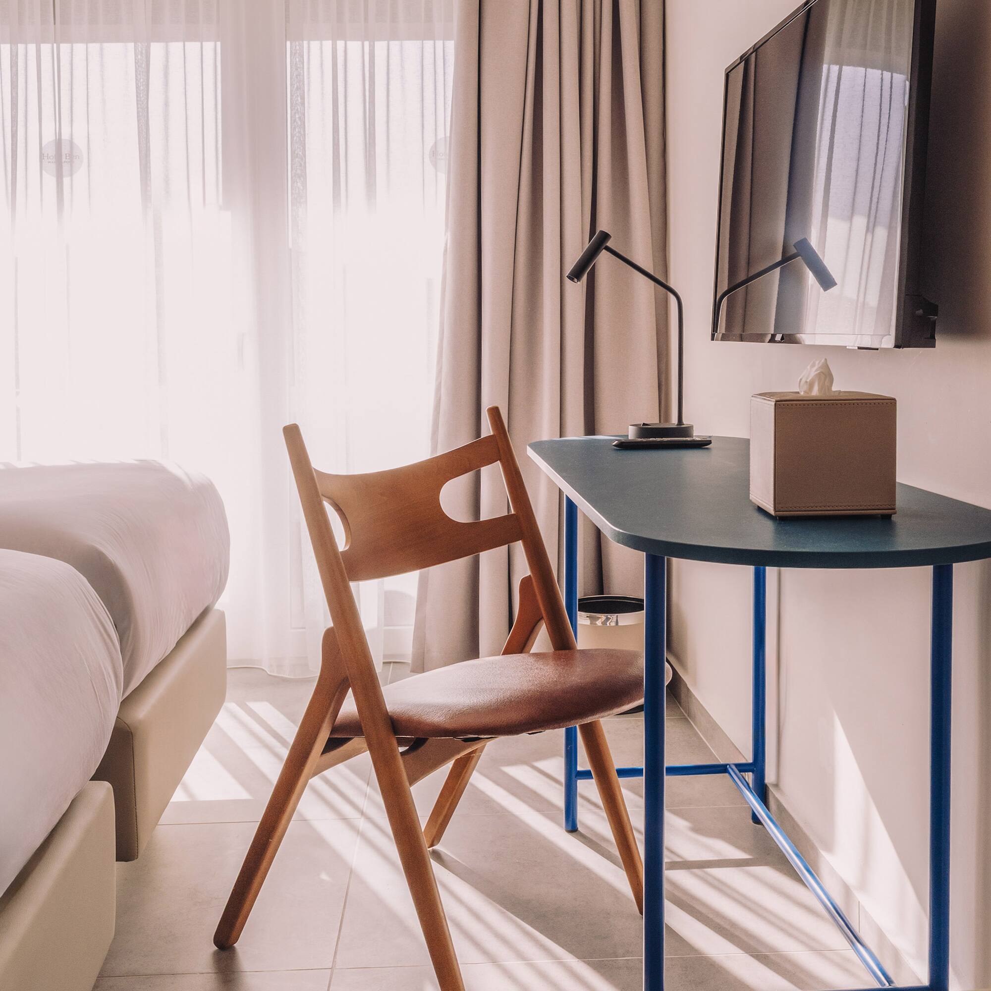 a chair and desk in a room