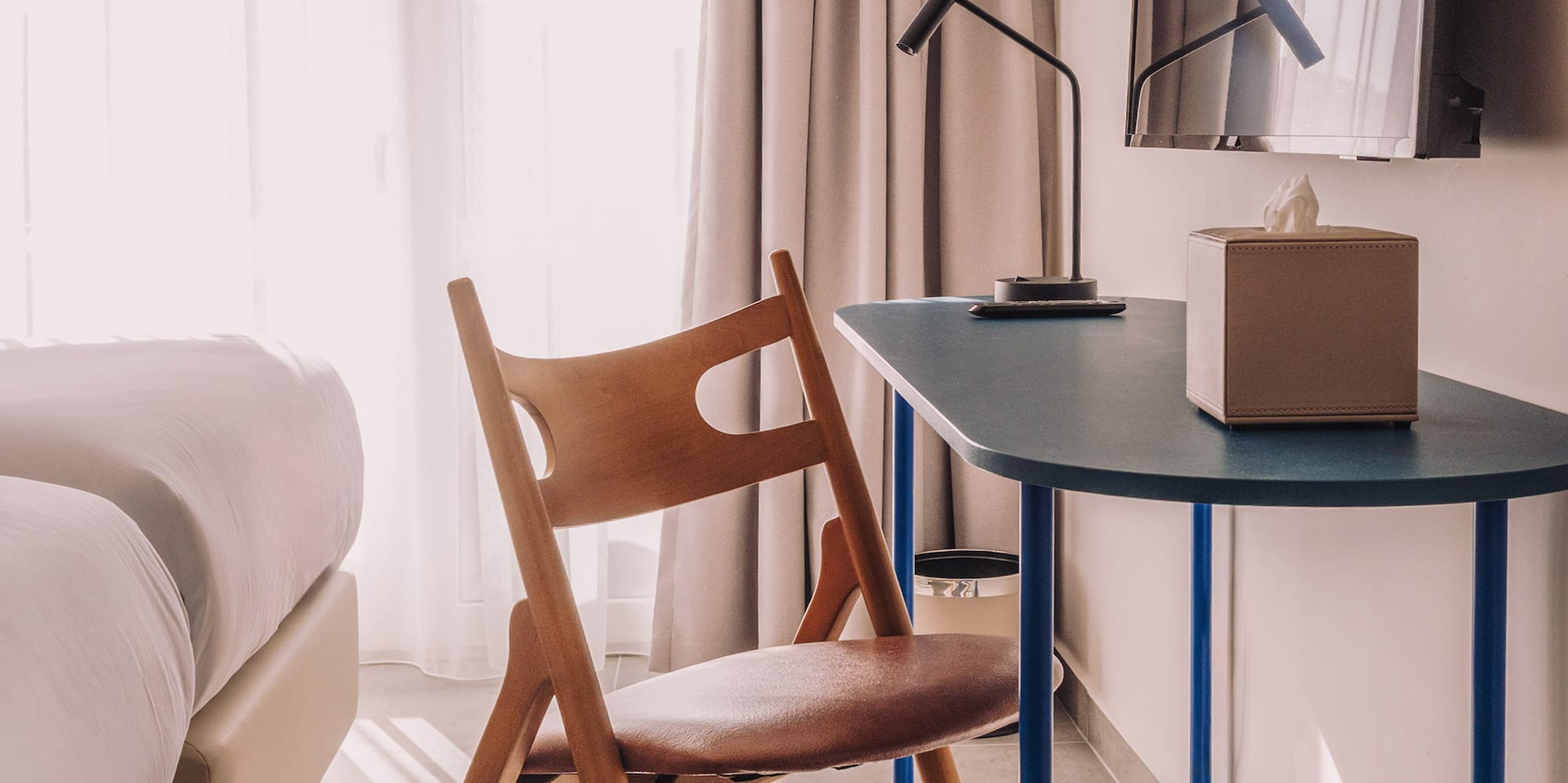 a chair and desk in a room