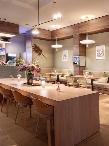 a room with a table and chairs