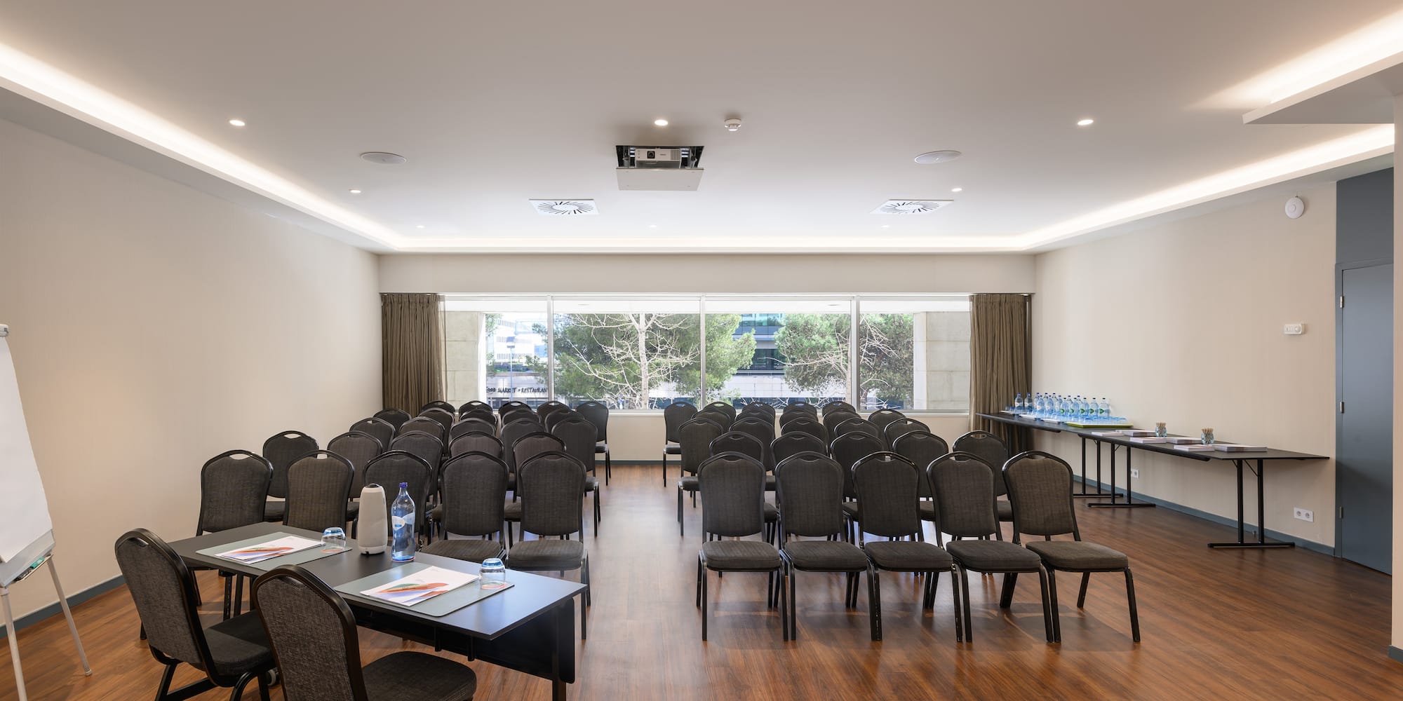 a room with chairs and tables