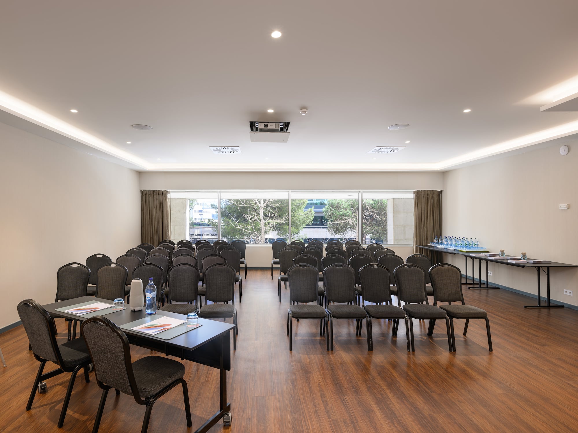 a room with chairs and tables