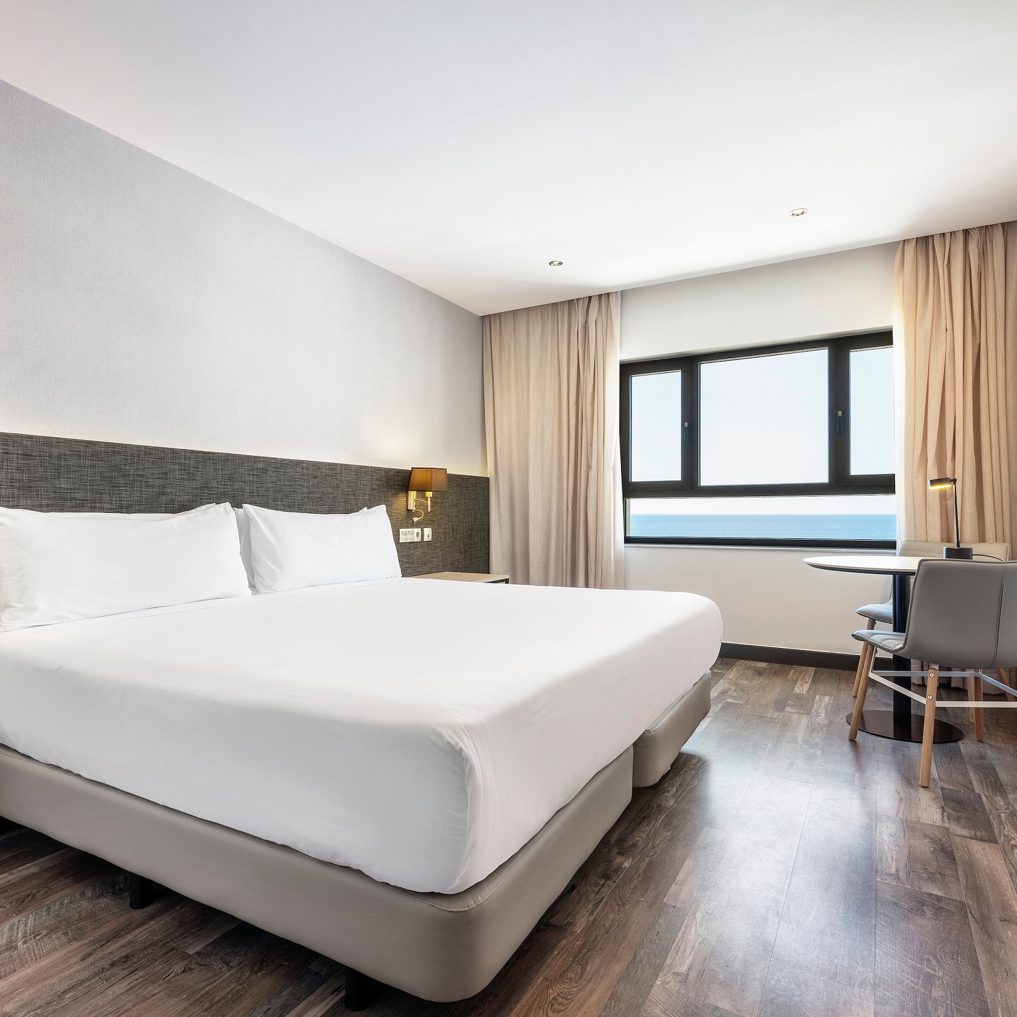 a room with a bed and a table