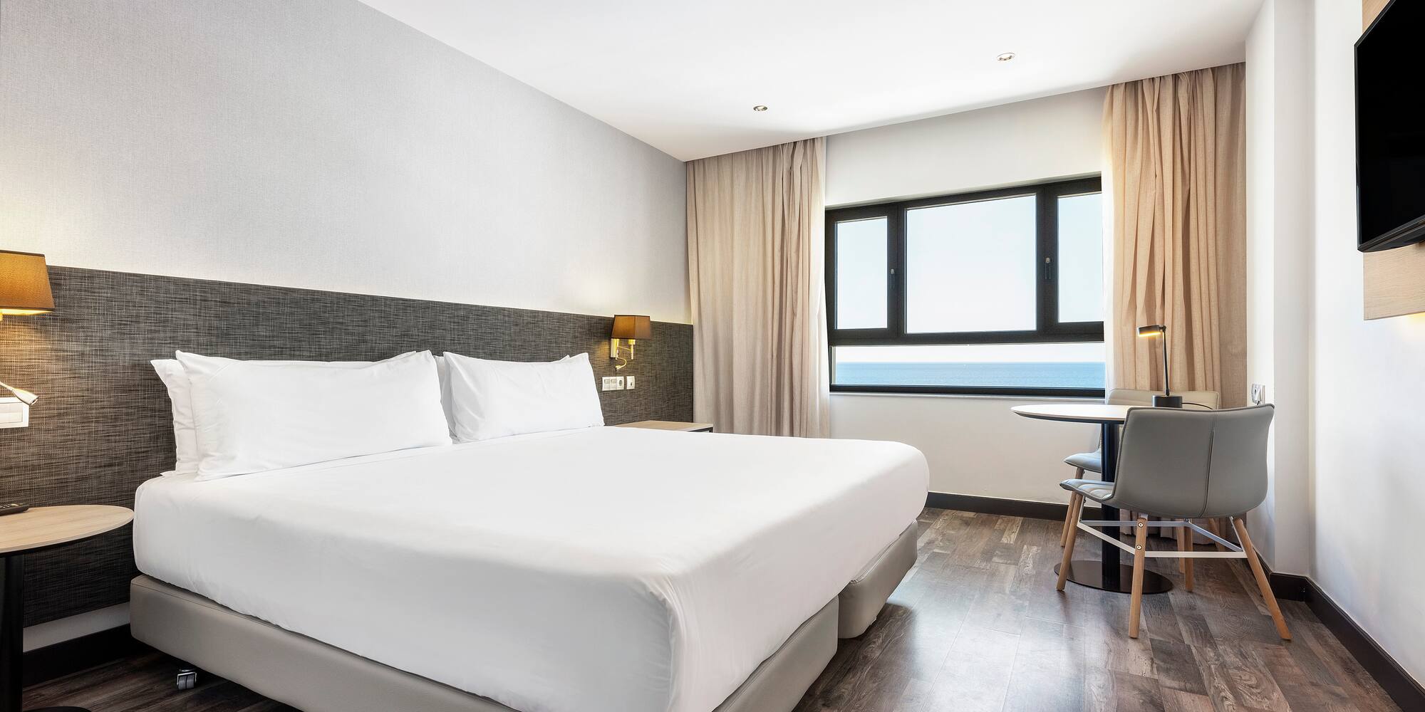 a room with a bed and a table