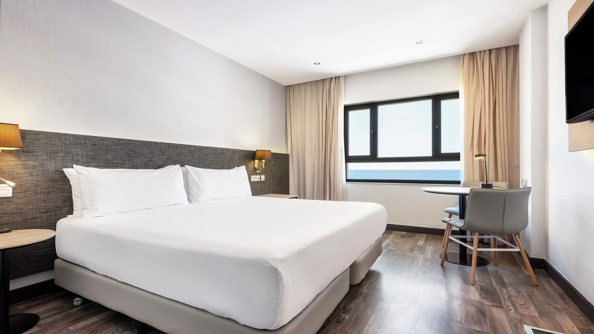 a room with a bed and a table