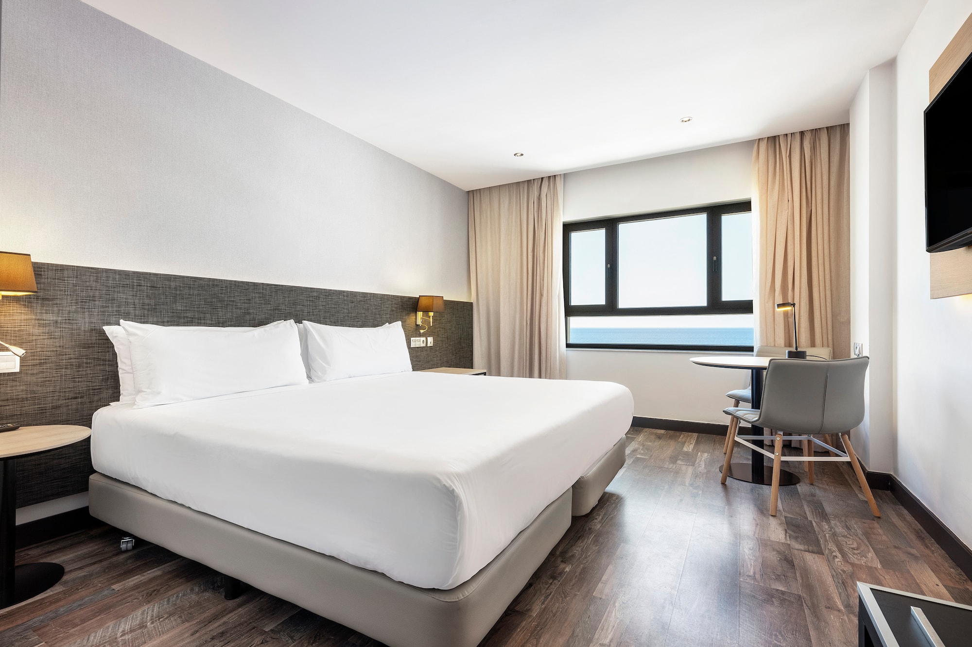 a room with a bed and a table