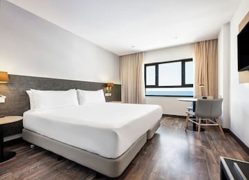 a room with a bed and a table