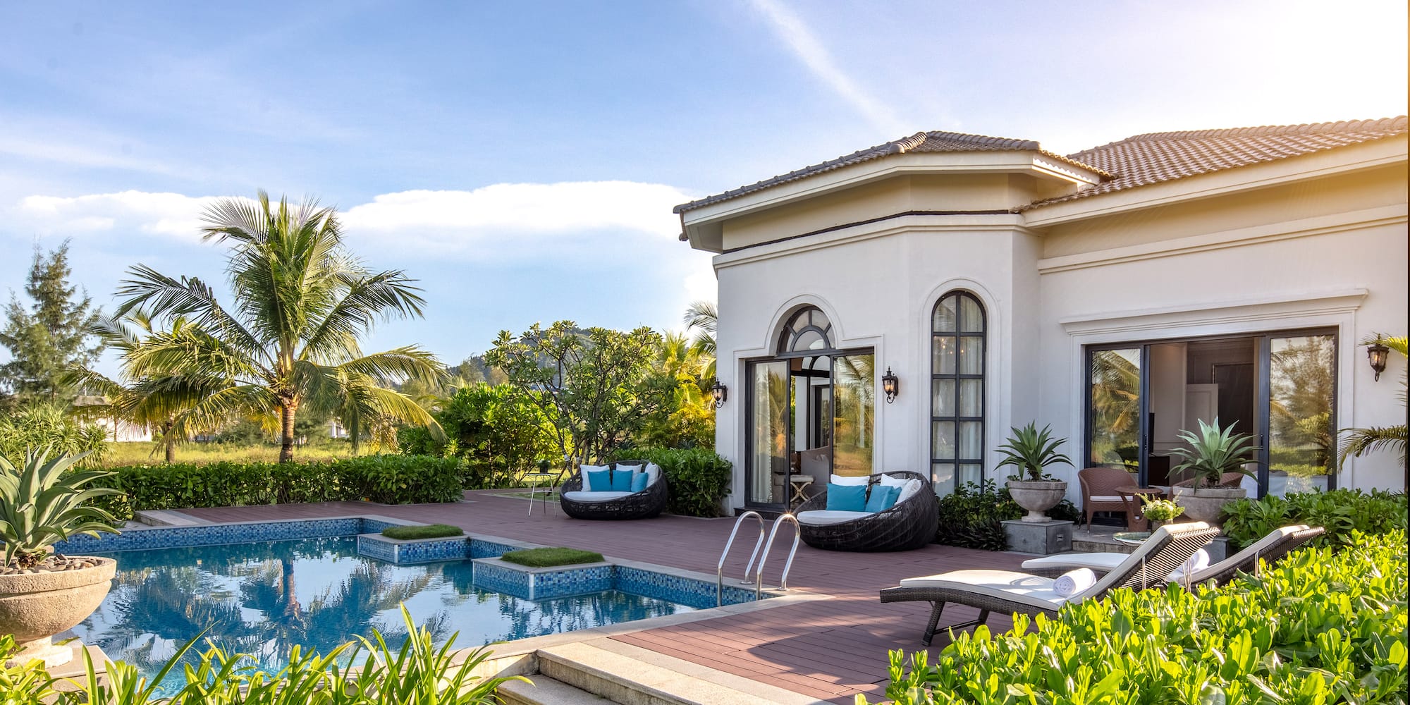 a pool in front of a house