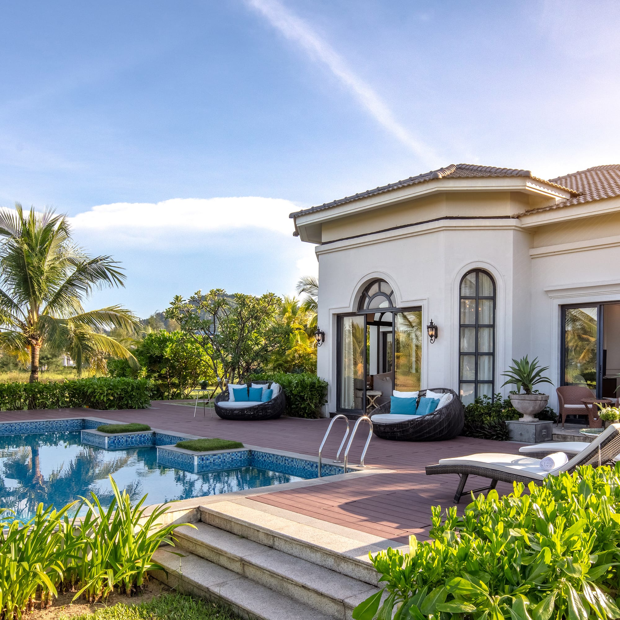 a pool in front of a house