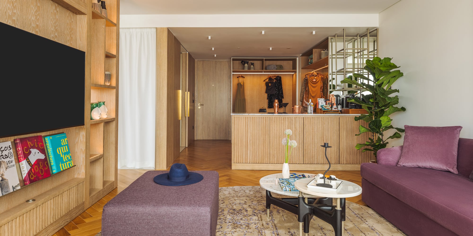 a living room with a couch and a tv